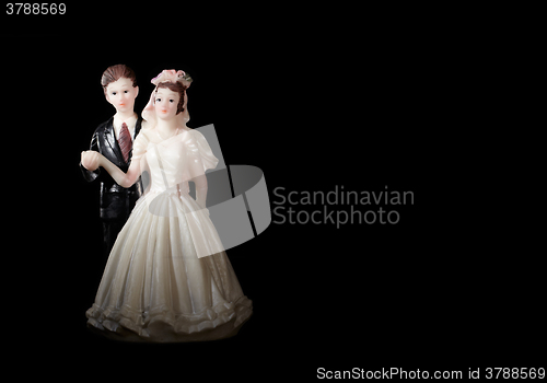 Image of Wedding cake figurines.