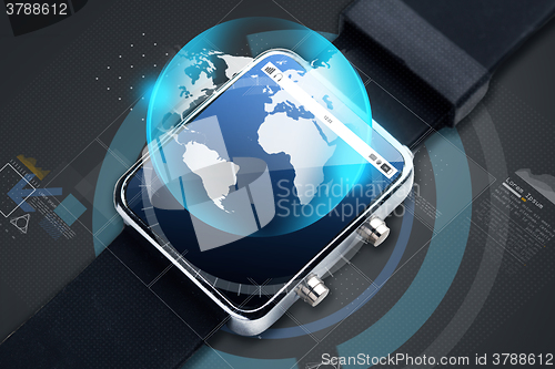 Image of close up of smart watch with earth globe hologram