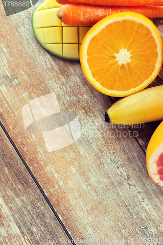 Image of close up of fresh juicy fruits on table