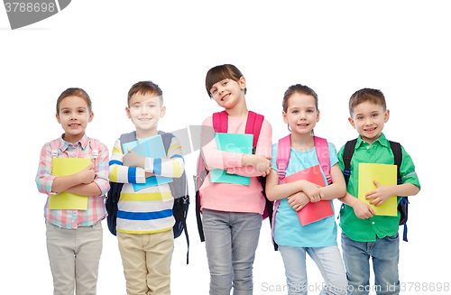 Image of happy children with school bags and notebooks