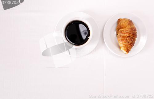 Image of Coffee and croissant for breakfast