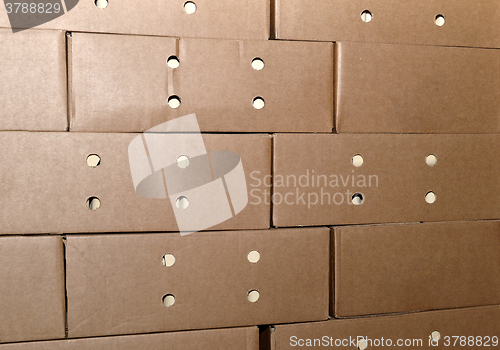 Image of Cardboard packing boxes in a warehouse, background