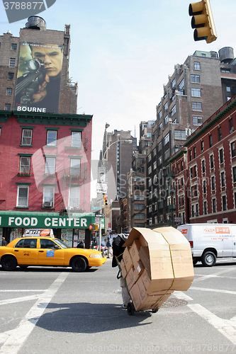 Image of Man with trolley in Manhattan