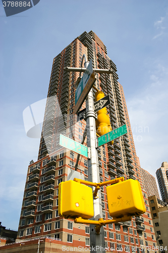 Image of Skyscraper and lamp post