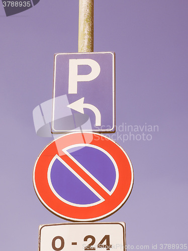 Image of  No parking sign over blue sky vintage