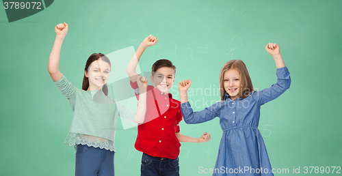 Image of happy boy and girls celebrating victory