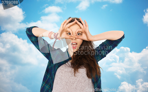 Image of happy teenage girl making face and having fun