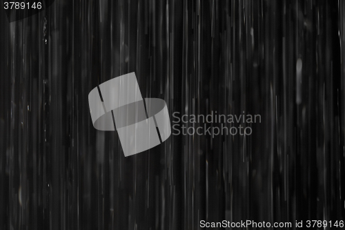 Image of Rain on black. Abstract background.