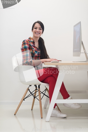 Image of startup business, woman  working on desktop computer