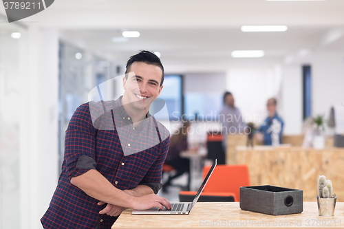 Image of startup business, young  man portrait at modern office