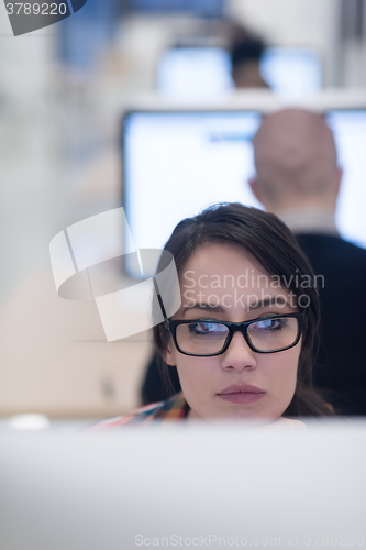 Image of startup business, woman  working on desktop computer