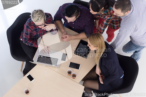 Image of aerial view of business people group on meeting