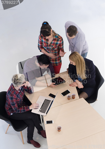 Image of aerial view of business people group on meeting