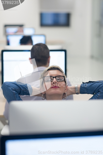 Image of startup business, woman  working on desktop computer