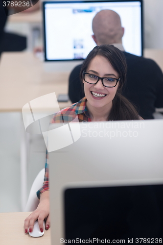 Image of startup business, woman  working on desktop computer