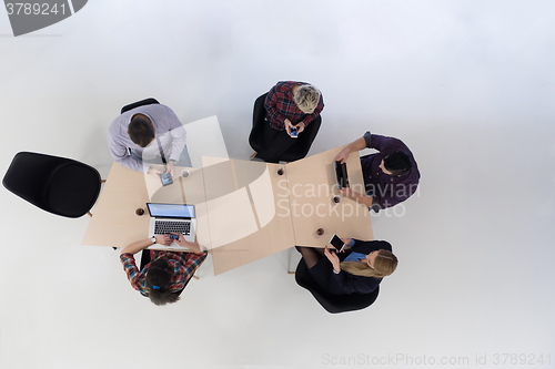 Image of aerial view of business people group on meeting