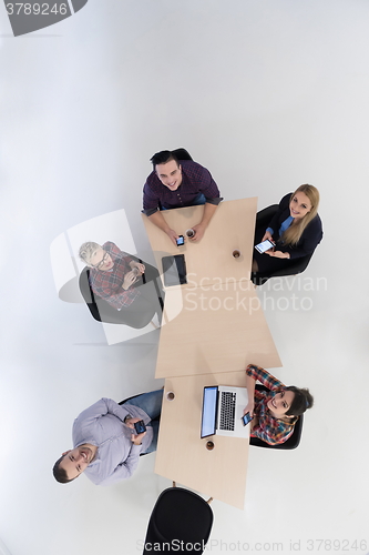 Image of aerial view of business people group on meeting