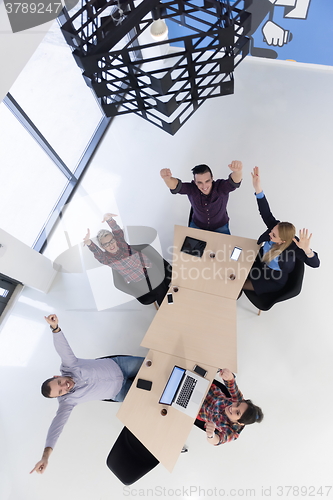 Image of aerial view of business people group on meeting