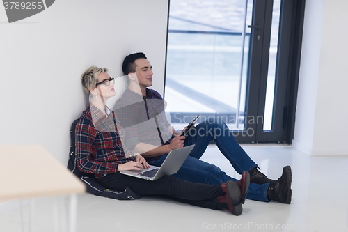 Image of startup business, couple working on laptop computer at office
