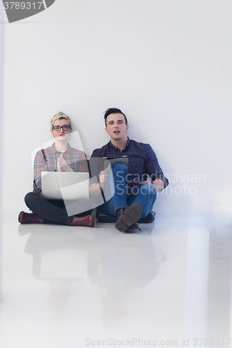 Image of startup business, couple working on laptop computer at office