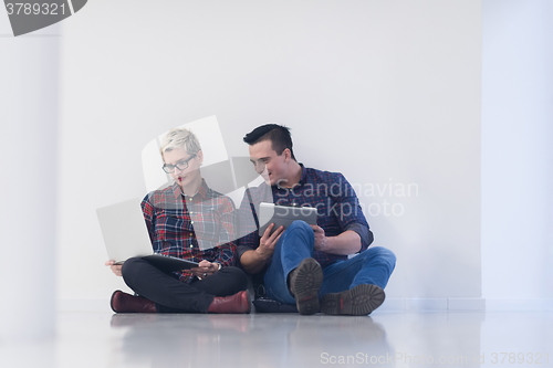 Image of startup business, couple working on laptop computer at office