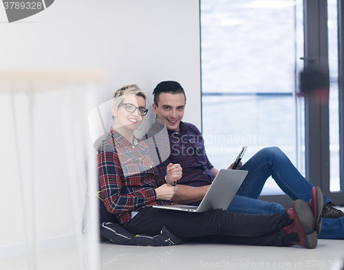 Image of startup business, couple working on laptop computer at office