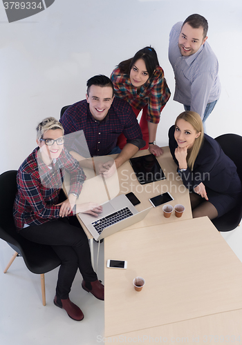 Image of aerial view of business people group on meeting