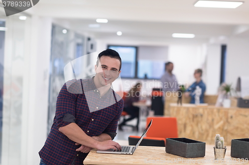 Image of startup business, young  man portrait at modern office