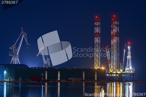 Image of Industrial cargo cranes in the dock