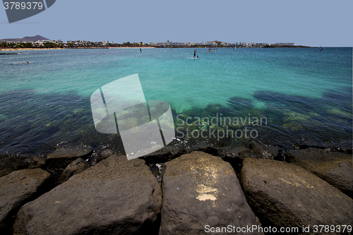 Image of windsurf pier boat in the blue sky   arrecife teguise