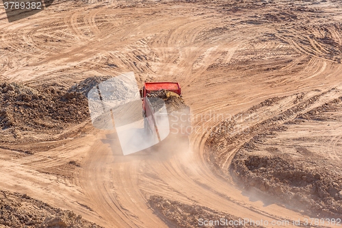 Image of Excavation site with construction machine