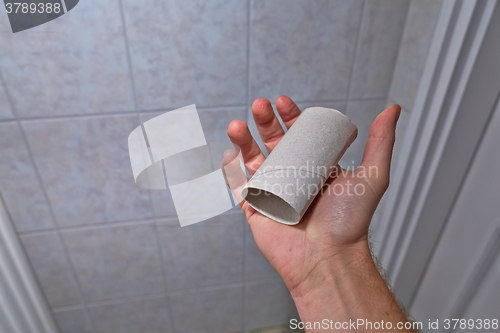 Image of Finding empty roll in the restroom