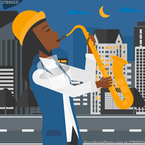 Image of Woman playing saxophone.