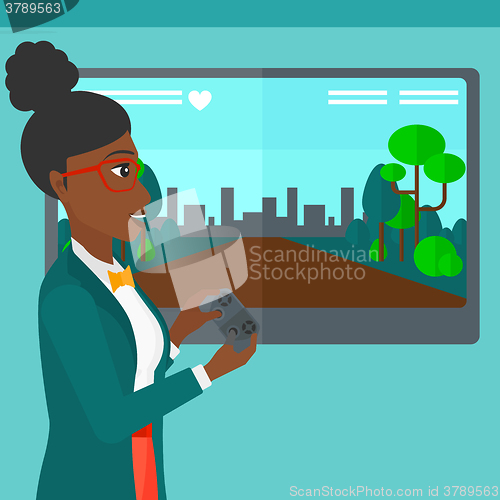 Image of Woman playing video game.
