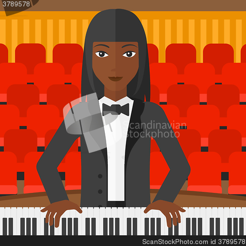 Image of Woman playing piano.