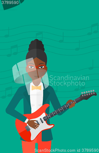 Image of Musician playing electric guitar.