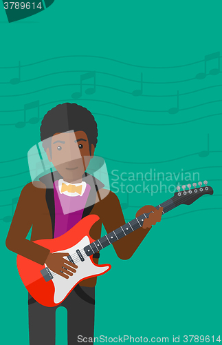 Image of Musician playing electric guitar.