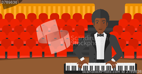 Image of Man playing piano.