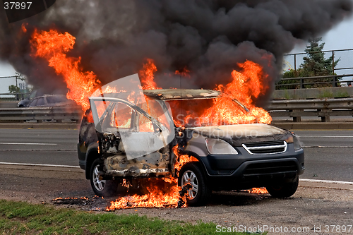 Image of fire burning car