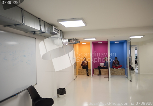 Image of group of business people in creative working  space