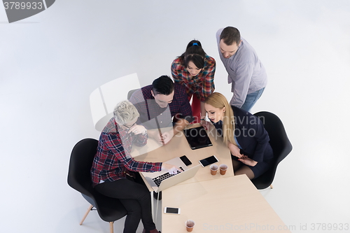 Image of aerial view of business people group on meeting