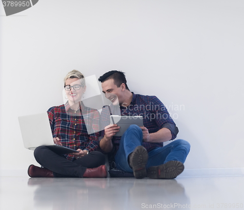 Image of startup business, couple working on laptop computer at office