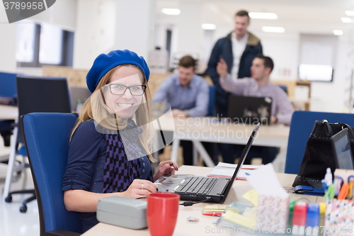 Image of startup business, woman  working on laptop