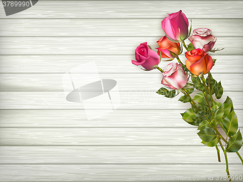 Image of Roses on a wooden background. EPS 10