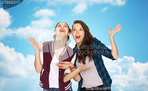 Image of happy smiling pretty teenage girls having fun