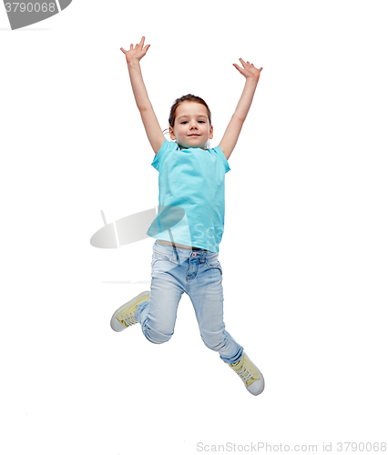 Image of happy little girl jumping in air