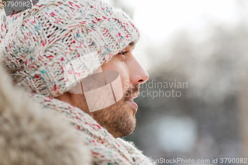 Image of face of happy man outdoors in winter