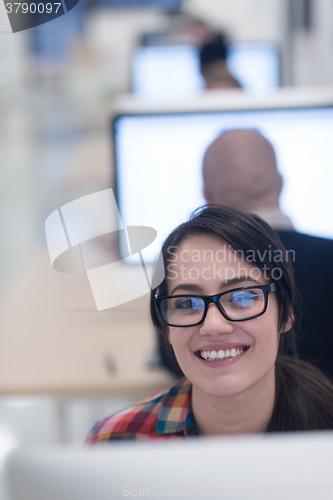 Image of startup business, woman  working on desktop computer