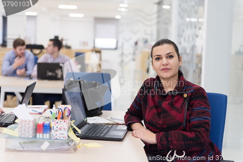 Image of startup business, woman  working on laptop