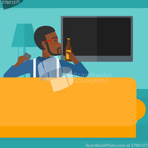 Image of Man watching TV.